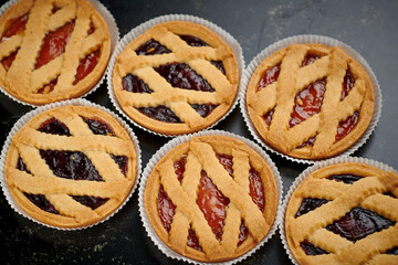 Six mini bakery tarts with marmalade
