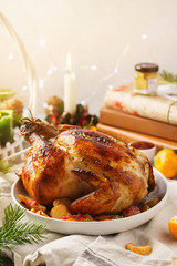 Traditional Christmas roast chicken with thyme and apples.
