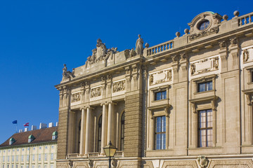 Fototapeta na wymiar Fragment of Hofburg Imperial Palace or Noye-Burg (now Museum of Ethnology) in Vienna