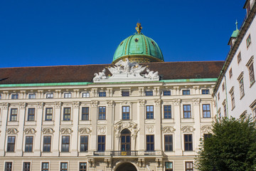 Fototapeta na wymiar Fragment of Hofburg - baroque palace complex with museums in Vienna