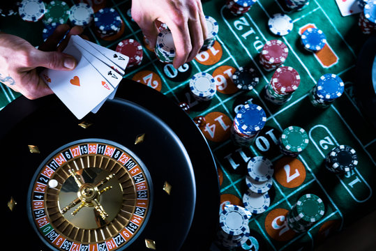 People and entertainment concept. Casino, gambling, poker,  roulete