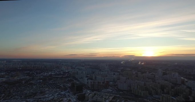 Aerial drone pedestal down shot of the sunset of the city of Moscow, Russia