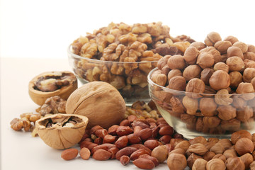 Different nuts in glass cups	