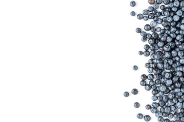 Delicious blueberries isolated on white table with copyspace. Top view