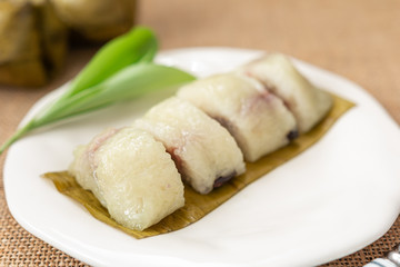 Thai dessert sticky rice or Khao Tom Mad, Wrapped the banana in sweet sticky rice and then wrapped them inside banana leaves.
