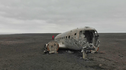 Fototapeta na wymiar Solheimasandur Plane Wreck, Iceland. Aerial overhead view of airplane wreckage on the beach