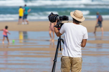 LACANAU (Gironde, France), photographe de surf sur la plage