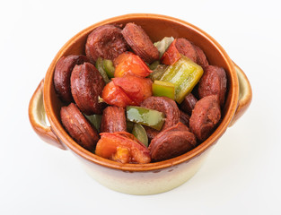 Fried Sausage with vegetables in a bowl isolated on white background