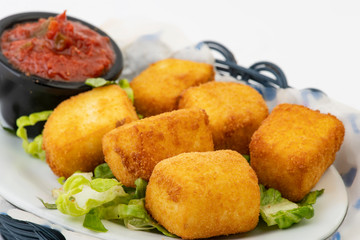 Breaded Cheesy Bites isolated on white, Mini Mozzarella sticks with dip isolated on white