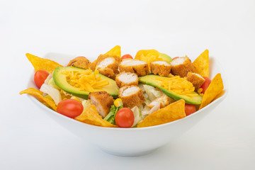 Crunchy Chicken Avocado Salad isolated on white background