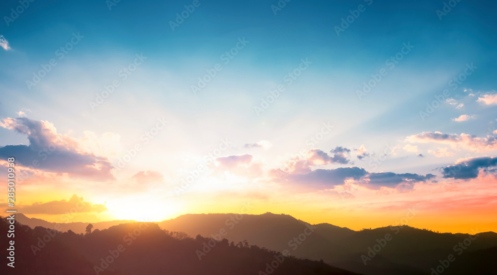 Wall mural international mountain day concept: beautiful sky sunset clouds landscape