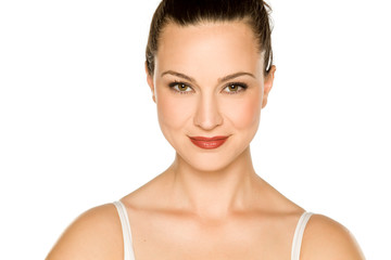 Portrait of beautiful young woman on white background