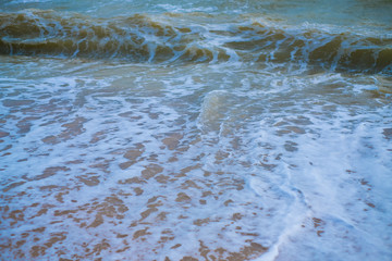 Summer vacation view of the blue sky with beautiful sea. wave ocean on sandy beach. for travel in the holidays. nature background.