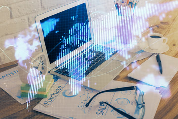 Double exposure of business theme icons and work space with computer background. Concept of success.