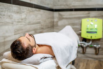 Man before the hydrocolonotherapy in the SPA salon