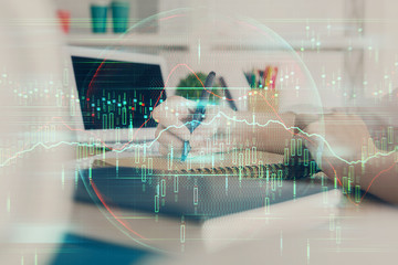 Financial graph displayed on woman's hand taking notes background. Concept of research. Double exposure