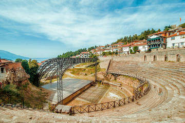 Ohrid. Macedonia amphitheater with houses on background