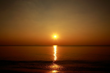 Sunset above the sea with beautiful sky