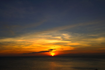 Sunset above the sea with beautiful sky