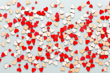 Happy Valentines day background. With small hearts on pastel background.