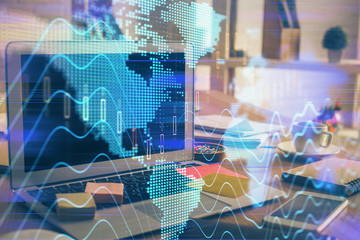 Forex Chart hologram on table with computer background. Double exposure. Concept of financial markets.