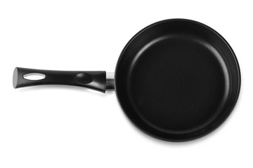 The black fry pan over white background