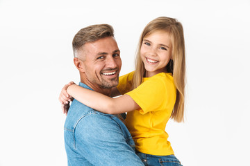 Photo closeup of attractive caucasian family father and daughter smiling and hugging together at camera