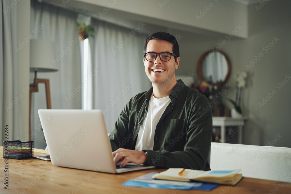 Wall mural portrait of a man working from home