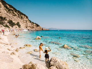 Obraz premium couple at the ocean of Sardinia during vacation in Europe
