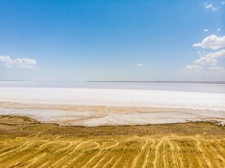 Fototapeta na wymiar Aerial view of Lake Tuz, Tuz Golu. Salt Lake. White salt water. It is the second largest lake in Turkey and one of the largest hypersaline lakes in the world. Central Anatolia Region