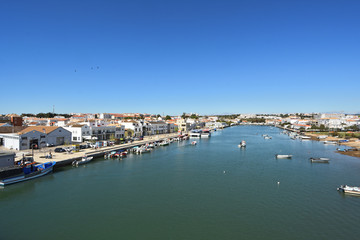 Naklejka na ściany i meble view of Tavira from the bridge dos Descobrimentos, Gilao river, Portugal