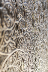 Traditional metal engraved souvenirs pattern at souvenir shop in Bosnia and Herzegovina. Silver...