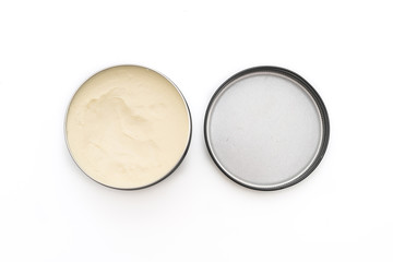Pomade for hair styling in oil based on white background