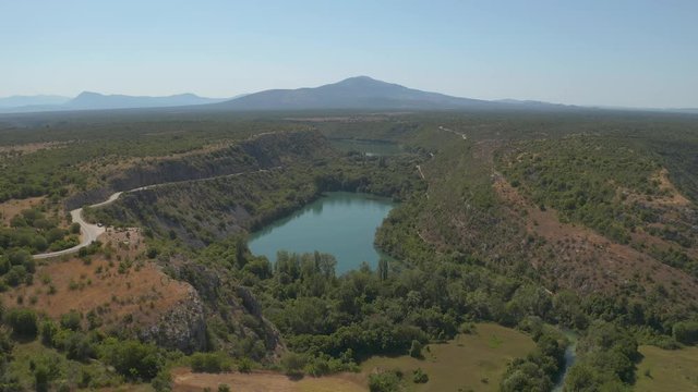 Brljan lake in Croatia, aerial ascent shot