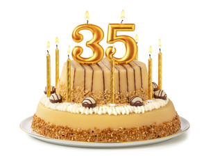 Festliche Torte mit goldenen Kerzen - Nummer 35