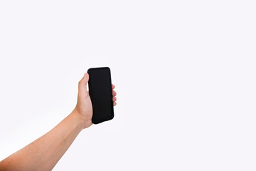 Man hand holding black cellphone with black screen at isolated background.
