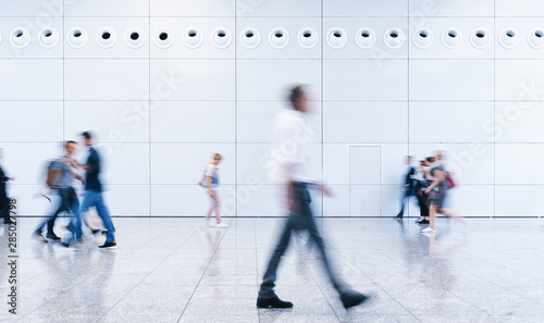 blurred business people at a trade fair