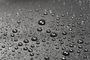 abstract water drops on a dark black  background