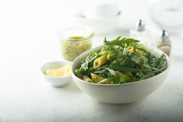 Pasta salad with pesto and arugula