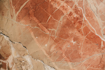 Marble surface as texture and background for design. Orange marble texture.   