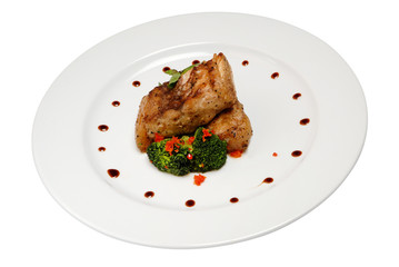 Fried rib of a young lamb with potato on white isolated background