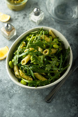 Pasta salad with pesto and arugula