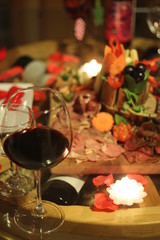 wine glass and cheese plate