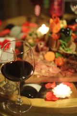 wine glass and cheese plate