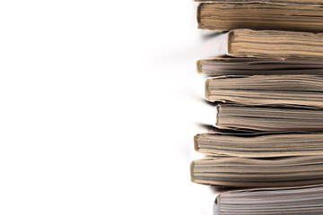 selective focus of the stacking magazine place on white background.