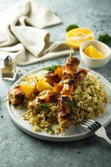 Homemade chicken skewers with bulgur and herbs