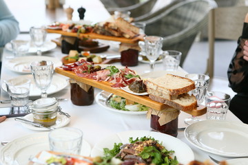 cutting on a wooden stand on the festive table