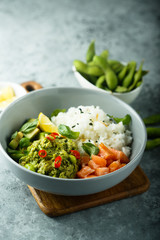 Rice bowl with smoked salmon and avocado