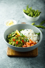 Rice bowl with smoked salmon and avocado