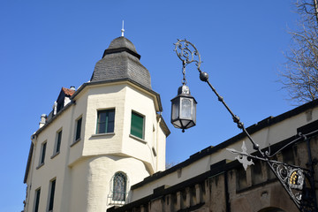 traditional street handmade iron work lamp outside on a medieval building in Mönchengladbach, Germany